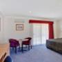 Guest room with table and chairs