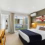 Guest room with three beds