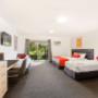 Guest room with three beds