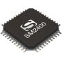 The SM2400 semiconductor chip developed by Semitech, showcasing its compact and innovative design tailored for power line communication technologies and IoT applications.