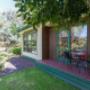 The Queen Room has its own private patio overlooking the garden.