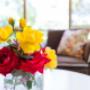 Vases of roses (in season) from the host's own garden decorate the main living areas to add fragrance and colour.
