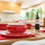All dinnerware, cutlery, glasses, bowls, cups, mugs, cooking utensils and dining accessories are provided. Also roasted coffee, teas, milk, sugar, condiments, jams, honey, sauces, oil and more.
