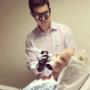 Dr Rodrigo Teixeira performing non-invasive procedure under topic local anaesthesia.