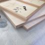Our 5ply cradled boards with hanging hardware ready for packing.