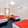 Guest room with three beds