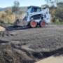 Bobcat, spreading recycled roadbase, driveway improvement