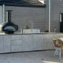 Custom made Outdoor BBQ kitchen featuring a Polite Pizza oven