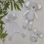 Knitted toy, comforter and rattle