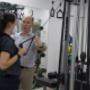 Allan Bourke instructs a patient on shoulder physio at Penrith Physiotherapy Sports Centre