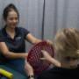 Ann-Lise Domingue instructs a patient on Hand Therapy at Penrith Physiotherapy Sports Centre