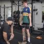 Youth athlete Josh performing a maximal isometric mid-thigh pull to test his lower body strength.
