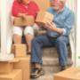 Couple packing and moving