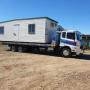 RELIABLY TRANSPORTING PORTABLE BUILDINGS AND SHIPPING CONTAINERS ACROSS SOUTHERN QUEENSLAND