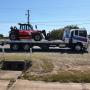 MJK Towing use a tilt tray tow truck to transport a range of vehicles, oversized items, and machinery. Tilt tray trucks have a moveable tray that can tilt to different angles to allow large loads to be slid onto the truck simply, easily, and safely, without scraping or damage. This is done by a hydraulic system that pulls the item onto the tray meaning that larger, heavier hauls can be loaded onto the truck for transportation of items that are difficult to lift onto a regular flatbed truck