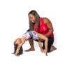 Coach helping gymnast with bridge