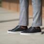 black leather sneakers