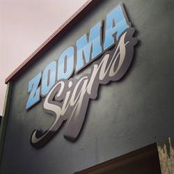 Zooma Signs