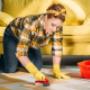 beautiful-woman-cleaning-carpet-at-home-2022-11-25-21-28-28-utc