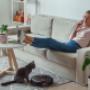 robotic-vacuum-cleaner-cleaning-carpet-woman-and-2023-06-05-23-05-53-utc