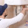 24 Hour Plumber Sydney installing water heater in a Sydney CBD bathroom