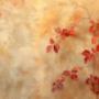 A Venetian plaster wall in a blend of warm reds oranges and yellows