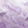 A soft lavender Venetian plaster wall with smooth subtle swirling patterns in slightly different sha