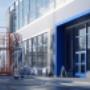 A commercial building exterior being painted in Parramatta
