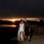 tocal homestead Bride and Groom kissing as the sunsets by Thierry Boudan Photography