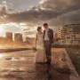 Bride and Groom in Newcastle on wedding day at merewether baths as the sunsets by Thierry Boudan Photography