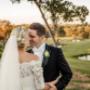 Bride and Groom on peppers creek venue sharing a kiss in the Hunter Valley scenic views