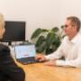 A one-on-one consultation between a business advisor and a client at Trekk Advisory Northern Rivers. The conversation is friendly and informative, reflecting the firm’s tailored approach to accounting and advisory services.