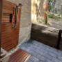 Outdoor shower area constructed with Australian hardwood.