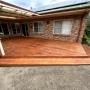 Pine Decking with surrounding steps coated with Merbau Decking Oil