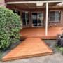Pine Decking with surrounding steps coated with Merbau Decking Oil
