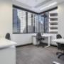 Modern, clean workspace where our Brisbane team repairs and services devices.