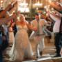 Lively wedding reception filled with laughter, dancing, and glowing lights, capturing the fun and energy of the celebration.