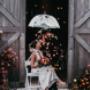 Romantic wedding portrait framed by elegant surroundings, highlighting love, emotion, and storytelling.