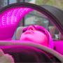 Client receiving dual wavelength LED Light Therapy