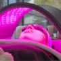 Client receiving dual wavelength LED Light Therapy