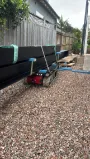 Tracked carrier platform transporting multiple steel beams
